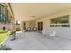 Relaxing covered patio with dining and seating area, perfect for outdoor entertaining and leisure at 6717 E Aire Libre Ln, Scottsdale, AZ 85254