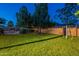 Spacious backyard with lush green grass and privacy fence offers a serene outdoor retreat at 7035 N 11Th Pl, Phoenix, AZ 85020