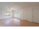 Spacious living area featuring wood floors, neutral walls, and ample natural light at 7035 N 11Th Pl, Phoenix, AZ 85020