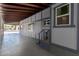 Spacious carport showcasing covered entry, and a peek into the surrounding neighborhood at 7343 E Juanita Ave, Mesa, AZ 85209