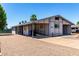 Property featuring desert landscaping, carport, wheelchair ramp, and a clean exterior design at 7343 E Juanita Ave, Mesa, AZ 85209