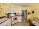 Well-maintained kitchen with modern appliances and tile floor, perfect for culinary adventures and everyday meals at 7343 E Juanita Ave, Mesa, AZ 85209
