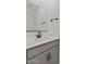 Modern half bath featuring black fixtures, white quartz countertop, and light grey cabinetry at 7427 S 75Th Ln, Laveen, AZ 85339