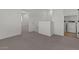 Upstairs hallway leading to the laundry room and other bedrooms at 7427 S 75Th Ln, Laveen, AZ 85339