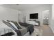 Tastefully decorated main bedroom with a comfortable king-size bed, neutral colors, and stylish furnishings at 7427 S 75Th Ln, Laveen, AZ 85339