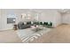 Spacious living room featuring modern furniture, décor, and open floor plan at 7428 S 75Th Ln, Laveen, AZ 85339