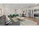 Spacious living room featuring modern furniture, décor, and open floor plan at 7428 S 75Th Ln, Laveen, AZ 85339