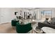 Open floor plan showcasing modern living room and eat-in kitchen at 7428 S 75Th Ln, Laveen, AZ 85339