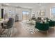 Open floor plan showcasing modern living room and eat-in kitchen at 7428 S 75Th Ln, Laveen, AZ 85339