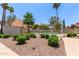 Well-maintained community pool area with clear blue water, landscaping and shaded seating at 7716 S Rita Ln, Tempe, AZ 85284