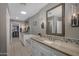 Bright bathroom with double sinks, vanity and tiled floors at 8343 E Quarterhorse Trl, Scottsdale, AZ 85258