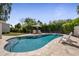 Inviting pool area with lounge chairs and lush landscaping, perfect for relaxation at 8343 E Quarterhorse Trl, Scottsdale, AZ 85258