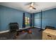 Home gym with workout bench, weights, squat rack, and rubber floor at 8343 E Quarterhorse Trl, Scottsdale, AZ 85258