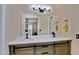 Stylish bathroom with a double sink vanity, marble countertops, and modern fixtures at 848 E Morningside Dr, Phoenix, AZ 85022