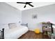 Bright bedroom with hardwood floors, ample natural light, and a comfortable daybed at 848 E Morningside Dr, Phoenix, AZ 85022