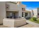 Inviting two-story home with a well-manicured lawn and front patio with outdoor seating at 848 E Morningside Dr, Phoenix, AZ 85022