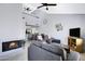 Bright and airy living room with a fireplace, comfortable seating, and a view of the kitchen at 848 E Morningside Dr, Phoenix, AZ 85022