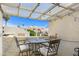 Inviting covered patio with table and seating offering a peaceful outdoor living space at 848 E Morningside Dr, Phoenix, AZ 85022
