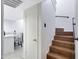 Staircase featuring wood steps and a custom metal handrail at 848 E Morningside Dr, Phoenix, AZ 85022