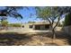 Tranquil backyard featuring a refreshing pool, and shaded patio area at 10232 N 86Th St, Scottsdale, AZ 85258