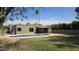Landscaped backyard with a pool, patio area, and modern exterior at 10232 N 86Th St, Scottsdale, AZ 85258