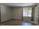 Bright bedroom with hardwood floors and a large window with great views at 10232 N 86Th St, Scottsdale, AZ 85258