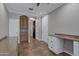 Inviting office with built-in desk, tiled flooring, and ample storage space at 10310 N 135Th Way, Scottsdale, AZ 85259