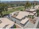Aerial view of residential homes with mountain views, desert landscaping, and outdoor pool at 12042 S 44Th St, Phoenix, AZ 85044