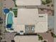 Aerial view of a home with a pool, a tiled roof, and well-manicured landscaping at 12042 S 44Th St, Phoenix, AZ 85044