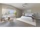 Bright bedroom with a vaulted ceiling, neutral paint, and a large window offering ample natural light at 12042 S 44Th St, Phoenix, AZ 85044
