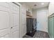 Functional laundry area with modern stacked washer and dryer, offering convenience and space-saving design at 12042 S 44Th St, Phoenix, AZ 85044