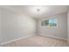 Cozy bedroom with neutral carpet, bright natural light, and a calm, inviting atmosphere at 12431 N 30Th Ave, Phoenix, AZ 85029