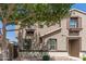 Inviting two-story home with a well-maintained exterior and desert landscaping at 1255 S Rialto -- # 115, Mesa, AZ 85209