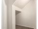 A hallway area with neutral paint and carpet at 1255 S Rialto -- # 115, Mesa, AZ 85209