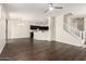 Spacious open-plan living area featuring hardwood floors and seamless flow to the kitchen at 1255 S Rialto -- # 115, Mesa, AZ 85209