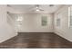 Modern living space with wood floors, neutral walls, and large windows for ample light at 1255 S Rialto -- # 115, Mesa, AZ 85209