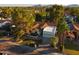 Aerial view showcases a well-maintained property with mature trees and landscaping at 12776 N 78Th St, Scottsdale, AZ 85260
