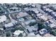 Aerial view of a residential area showcasing a home with a private pool and mature trees at 1332 E Charleston Ave, Phoenix, AZ 85022