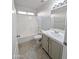 Bathroom featuring a vanity with a sink and a shower/tub combo at 1332 E Charleston Ave, Phoenix, AZ 85022