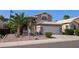 Charming two-story home with desert landscaping, tile roof, and a two-car garage, located on a well-maintained street at 1332 E Charleston Ave, Phoenix, AZ 85022