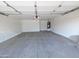 Spacious garage with clean floors and a water heater, offers ample parking and storage at 1332 E Charleston Ave, Phoenix, AZ 85022