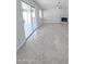 Spacious living room with fireplace, and sliding glass doors leading to the patio at 1332 E Charleston Ave, Phoenix, AZ 85022