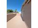Side patio featuring a stucco wall, offering a private outdoor space at 1332 E Charleston Ave, Phoenix, AZ 85022