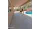 Covered patio space next to an inviting pool, perfect for outdoor relaxation at 1332 E Charleston Ave, Phoenix, AZ 85022
