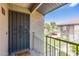 Secured front door and welcome mat leading to the unit's entry at 1402 E Guadalupe Rd # 207, Tempe, AZ 85283