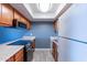 Efficient kitchen layout featuring modern appliances and ample cabinet space at 1402 E Guadalupe Rd # 207, Tempe, AZ 85283