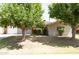 Charming single-story home with mature trees and a well-maintained lawn at 1412 W 7Th Pl, Tempe, AZ 85281