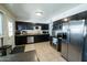 Modern kitchen with stainless steel appliances and ample counter space at 1412 W 7Th Pl, Tempe, AZ 85281