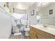 Quirky bathroom featuring a vanity sink, toilet, and a novelty shower curtain at 1575 S Pennington Dr, Chandler, AZ 85286