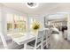 Dining room view leading to the staircase, featuring an open floor plan and lots of light at 1575 S Pennington Dr, Chandler, AZ 85286